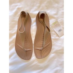 Woman’s Crocs Sexy Flip size 8 Wide in Bronze